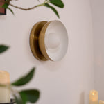 Solar Eclipse Brass Wall Sconce with Glass Shade for Modern Interiors