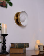 Solar Eclipse Brass Wall Sconce with Glass Shade for Modern Interiors