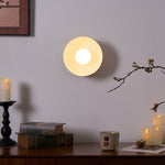 Solar Eclipse Brass Wall Sconce with Glass Shade for Modern Interiors