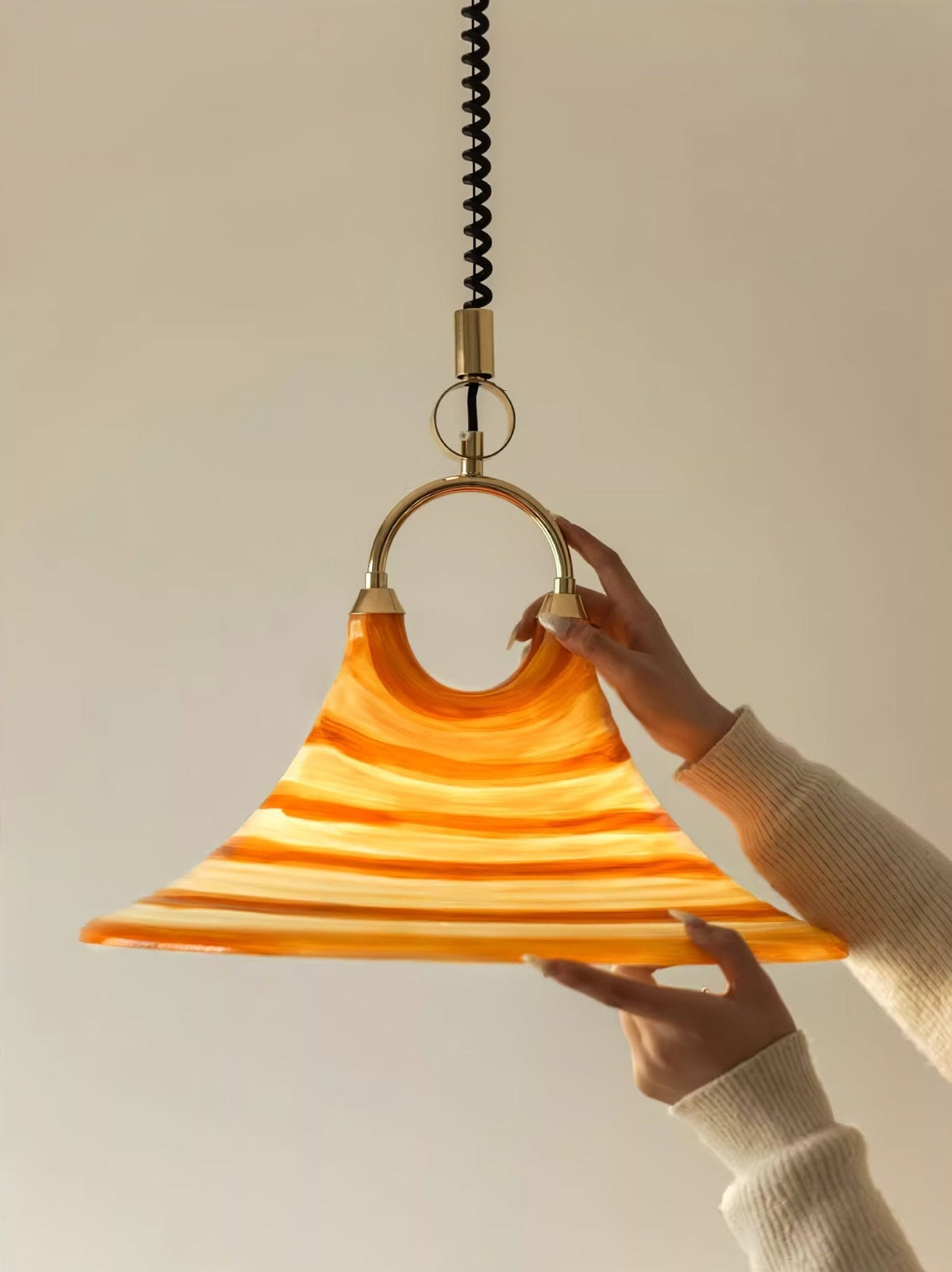 Solari Swirl Glass Pendant Light – Hand-Blown Amber Art Glass
