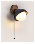 Solstice Pivot Wall Sconce in Black Travertine and Walnut