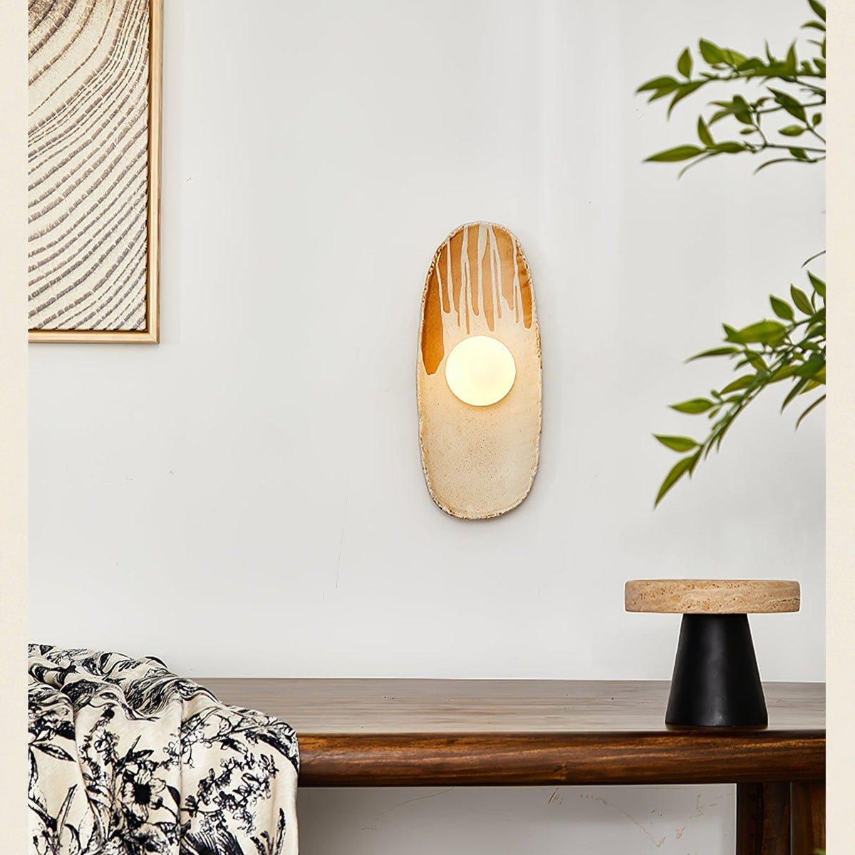 Solstice Swirl Ceramic Wall Sconce with Glowing Orb