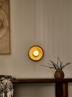 Solstice Swirl Ceramic Wall Sconce with Glowing Orb