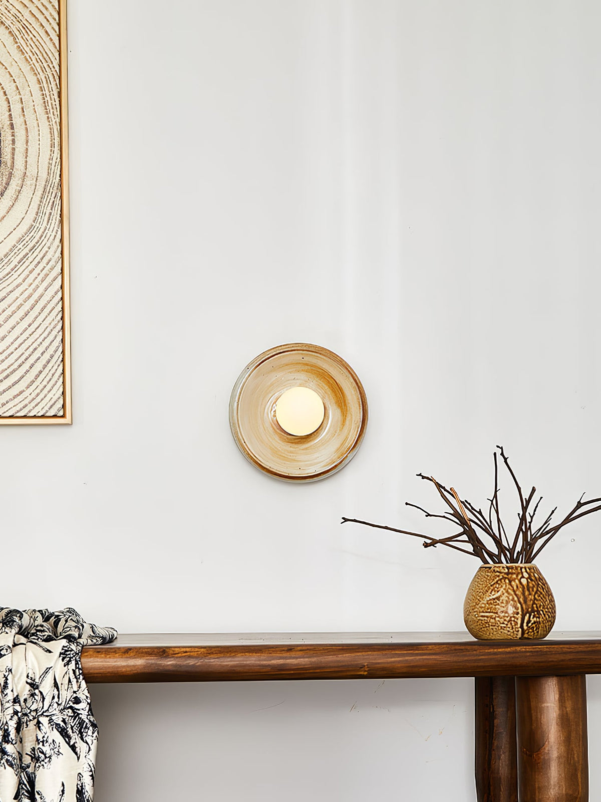 Solstice Swirl Ceramic Wall Sconce with Glowing Orb