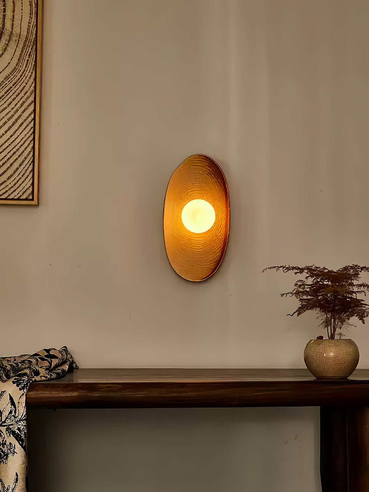 Solstice Swirl Ceramic Wall Sconce with Glowing Orb