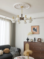 Solviento Modern Brass and Wood Chandelier with Glass Globes