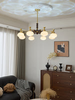 Solviento Modern Brass and Wood Chandelier with Glass Globes