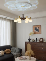 Solviento Modern Brass and Wood Chandelier with Glass Globes