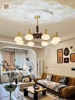 Solviento Modern Brass and Wood Chandelier with Glass Globes