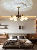 Solviento Modern Brass and Wood Chandelier with Glass Globes