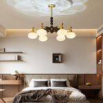 Solviento Modern Brass and Wood Chandelier with Glass Globes