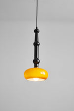 Solvra Modern Wood and Amber Glass Pendant Light for Dining Room