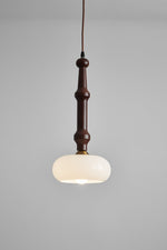 Solvra Modern Wood and Amber Glass Pendant Light for Dining Room
