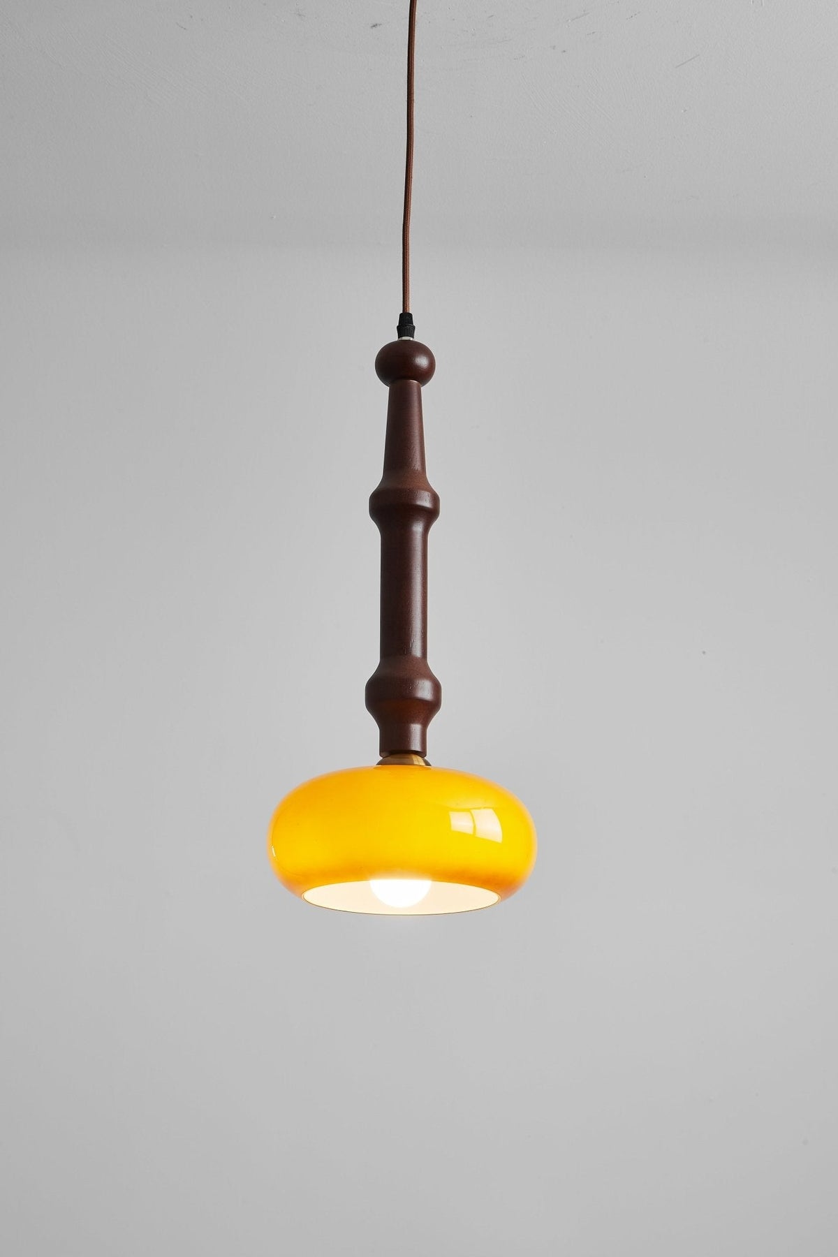 Solvra Modern Wood and Amber Glass Pendant Light for Dining Room