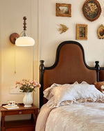 Spindlecrest Wall Sconce with Opal Glass Shade and Walnut Wood Backplate