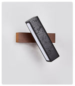 Stellar Pivot Sconce — Black Travertine & Walnut LED Wall Light