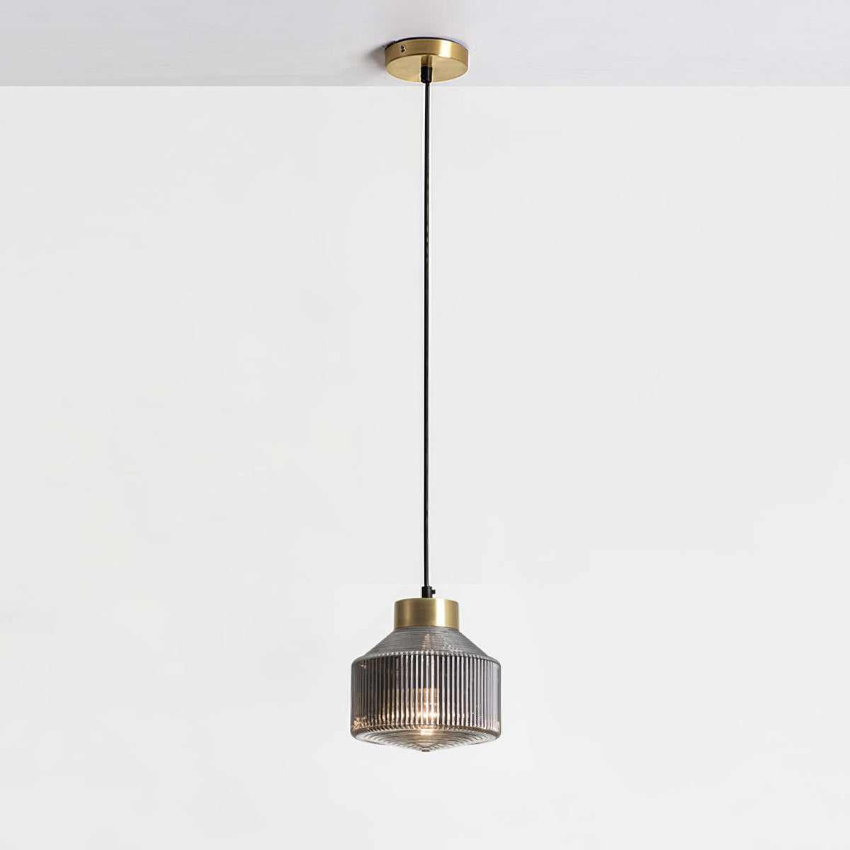 Art Glass Spinning Top Pendant Light in Gold for Dining & Living Spaces