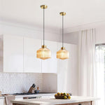 Art Glass Spinning Top Pendant Light in Gold for Dining & Living Spaces