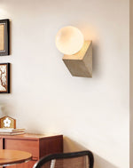 Tavian Orb Travertine Wall Sconce with Glass Globe