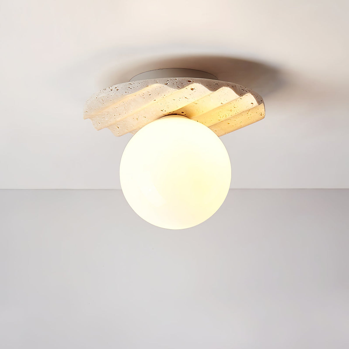 Terra Globe Ceiling Light in Hand-Chiseled Travertine with Opal Glass Shade