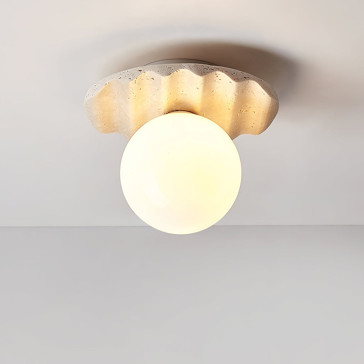 Terra Globe Ceiling Light in Hand-Chiseled Travertine with Opal Glass Shade