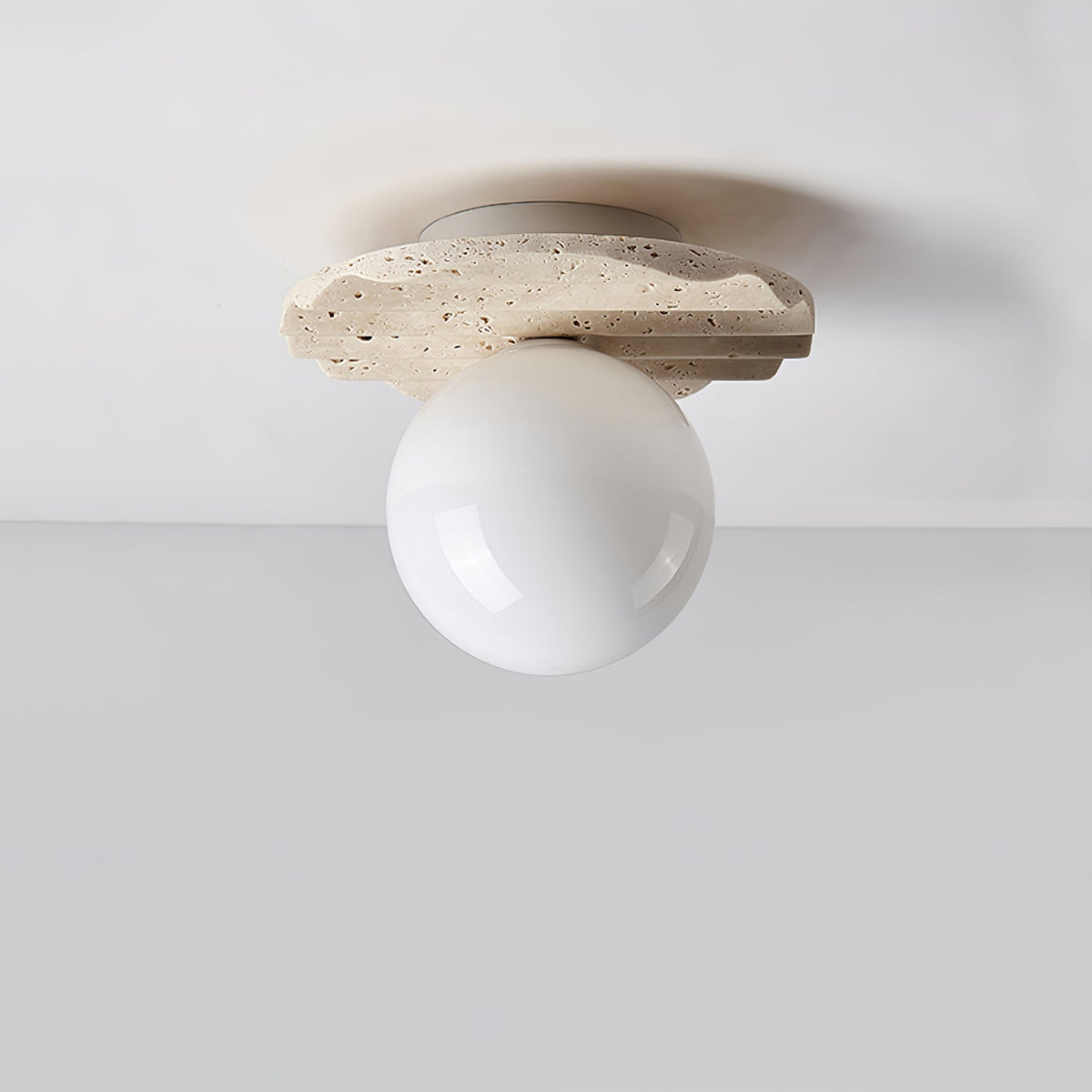 Terra Globe Ceiling Light in Hand-Chiseled Travertine with Opal Glass Shade