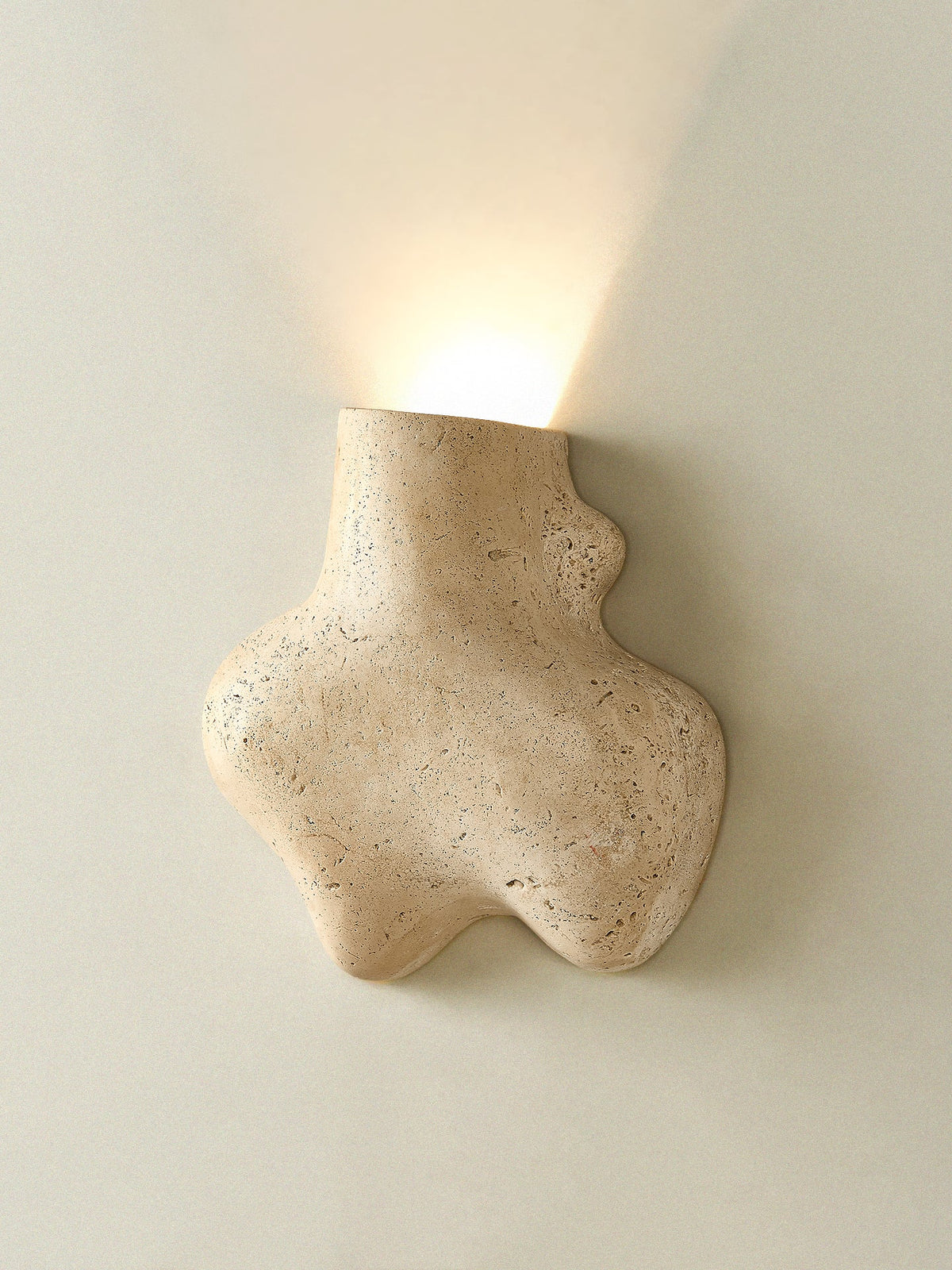 Travertine Abstract Wall Sconce with Warm Ambient Glow