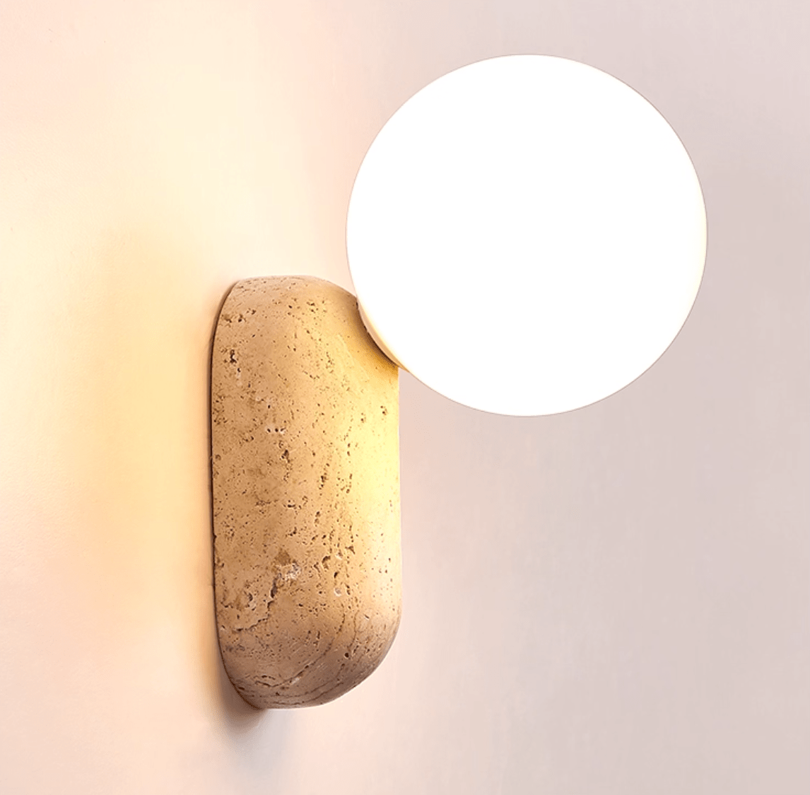 Travertine Pebble Wall Sconce with Opal Glass Globe for Modern Interiors