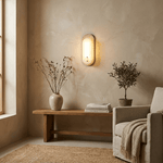 Travertine Pill Wall Sconce with Alabaster Glow and Aged Brass Accents