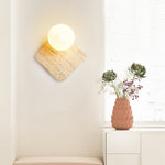 Travora Globe Wall Sconce in Natural Travertine with Opal Glass Shade