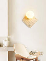 Travora Globe Wall Sconce in Natural Travertine with Opal Glass Shade
