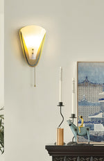 Geometric Gold Wall Sconce with Tassel Accent for Modern Interiors