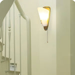 Geometric Gold Wall Sconce with Tassel Accent for Modern Interiors