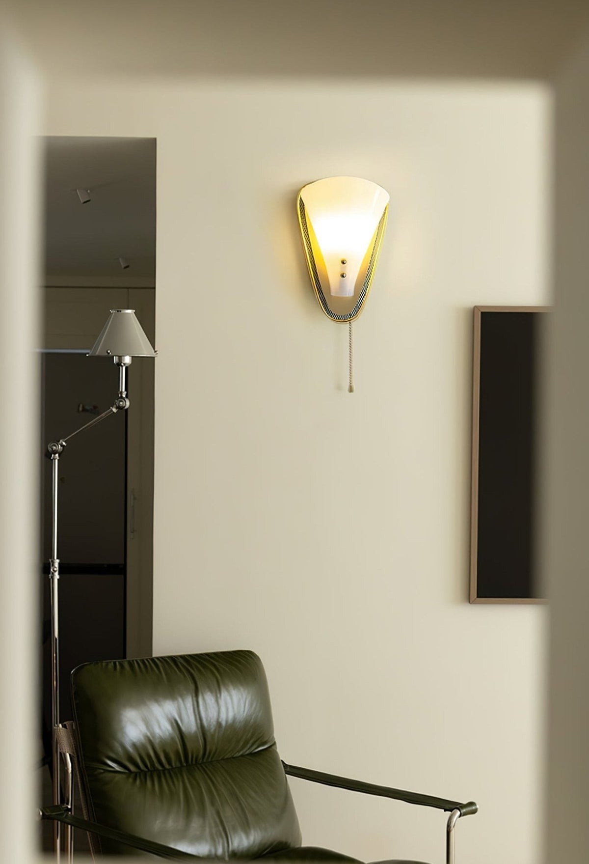 Geometric Gold Wall Sconce with Tassel Accent for Modern Interiors