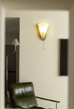 Geometric Gold Wall Sconce with Tassel Accent for Modern Interiors