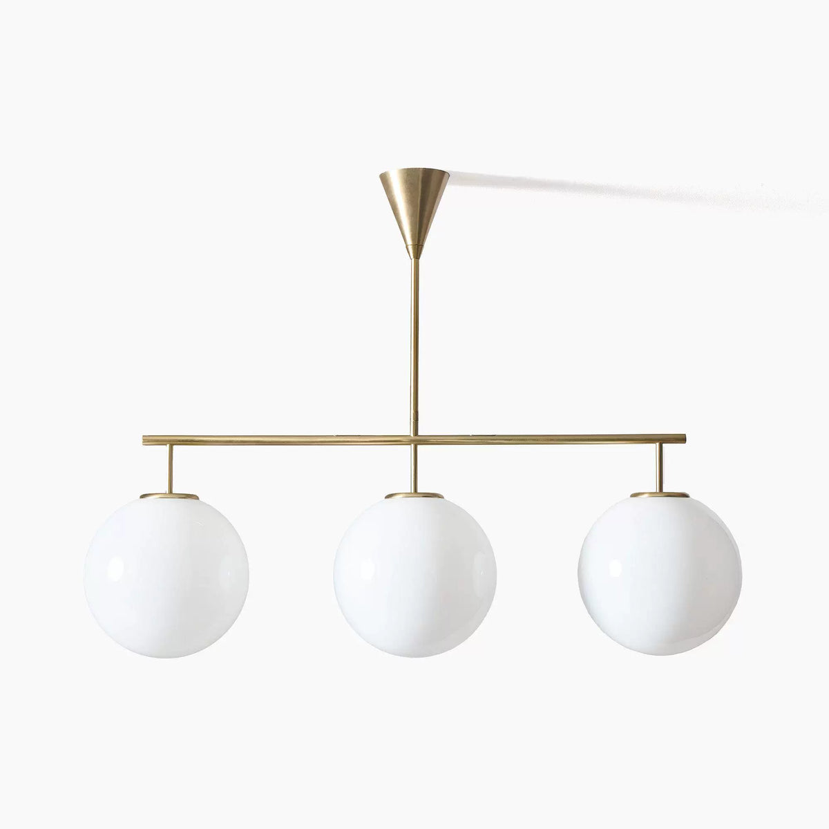 Trilo Globe Pendant Light – Three Opal Glass Spheres on a Sleek Bar