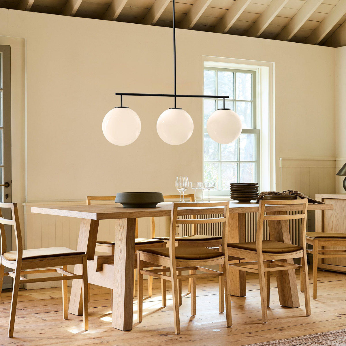Trilo Globe Pendant Light – Three Opal Glass Spheres on a Sleek Bar