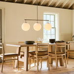 Trilo Globe Pendant Light – Three Opal Glass Spheres on a Sleek Bar