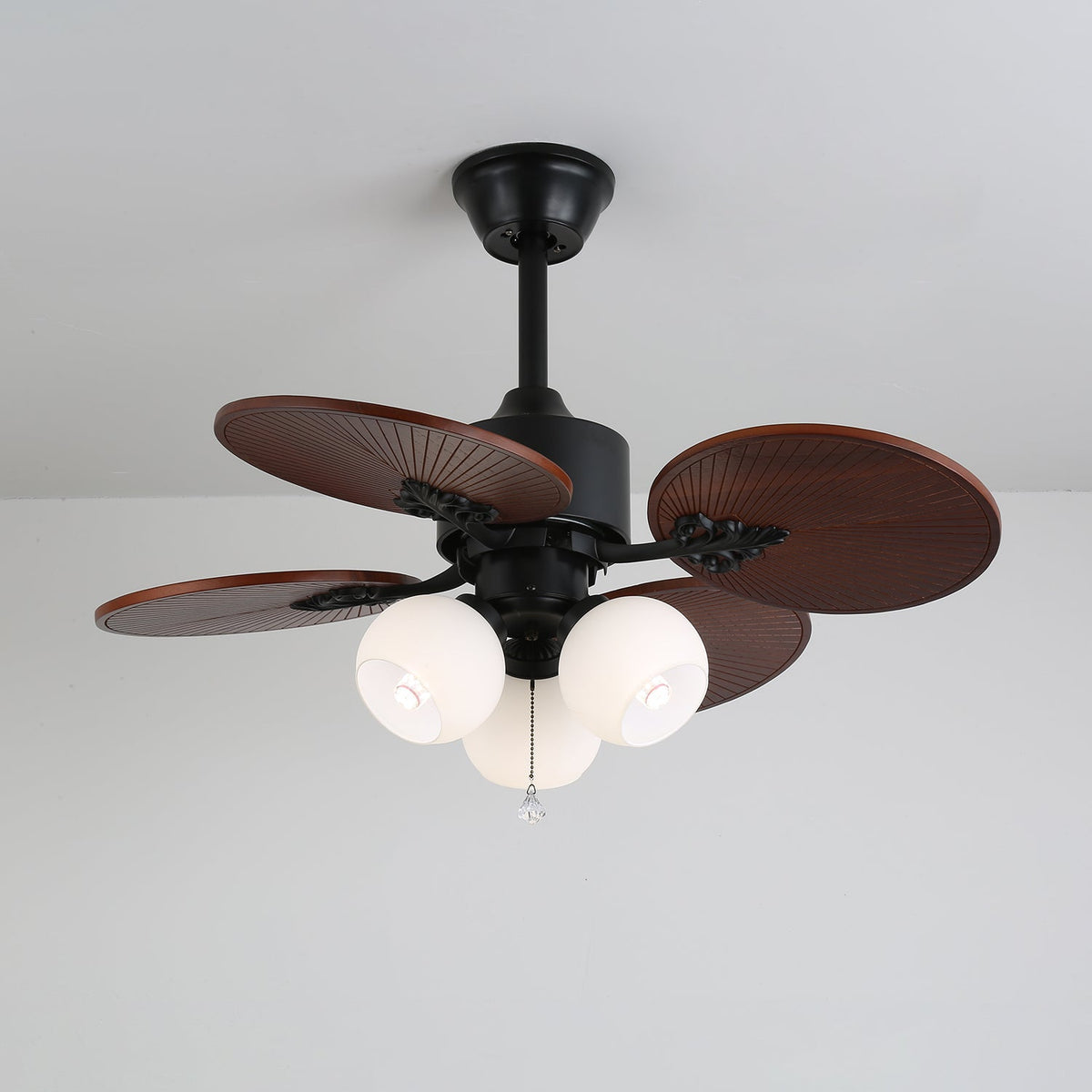 Tropica Breeze Ceiling Fan Light with Palm Blades and Amber Glass