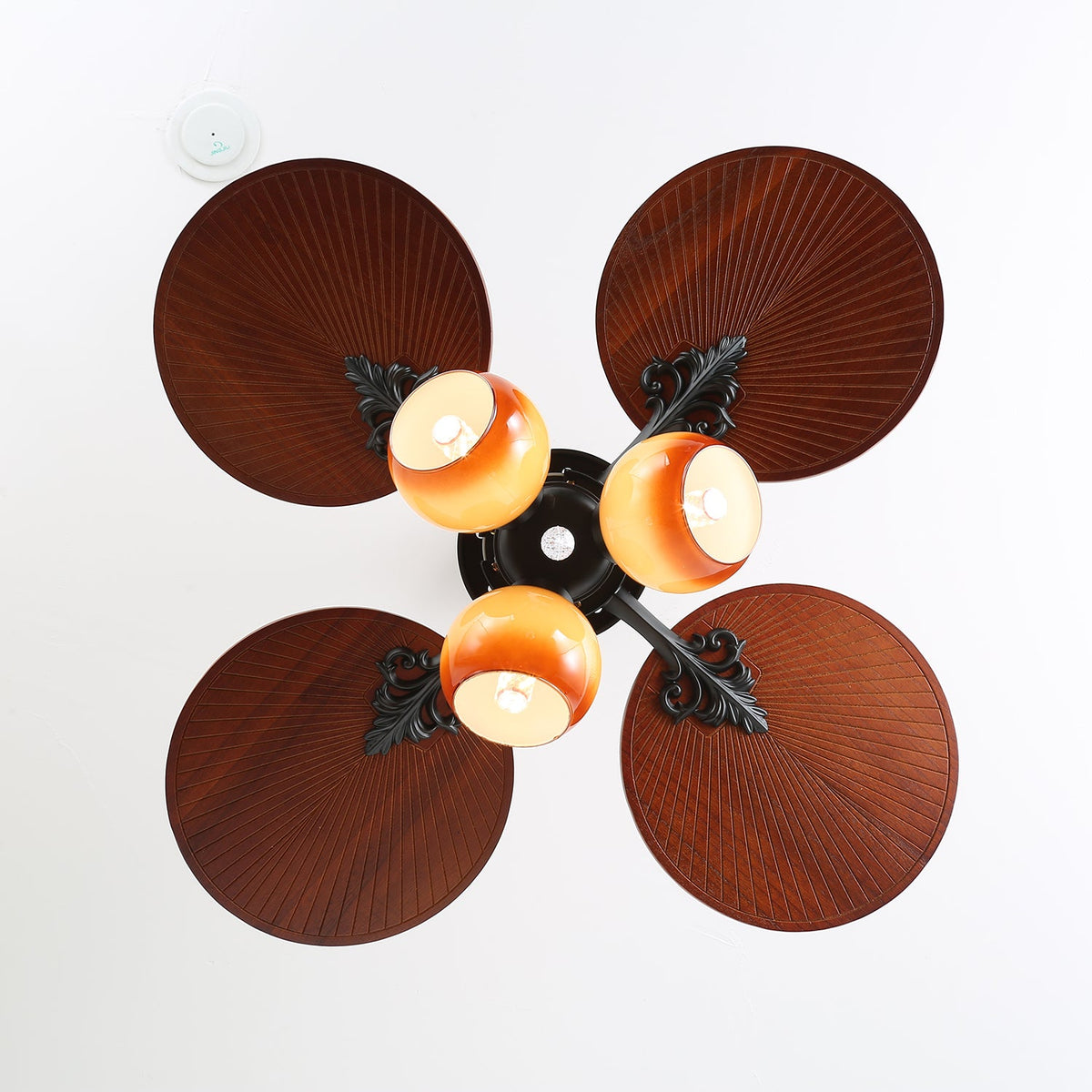 Tropica Breeze Ceiling Fan Light with Palm Blades and Amber Glass