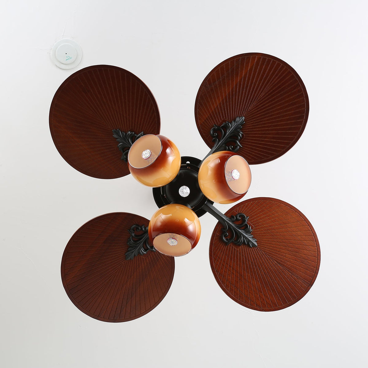 Tropica Breeze Ceiling Fan Light with Palm Blades and Amber Glass