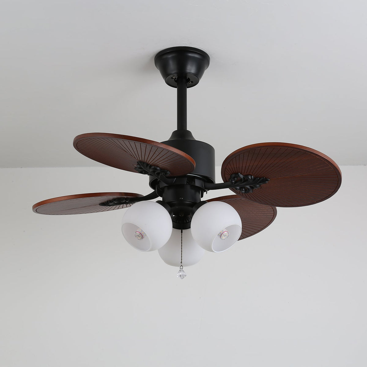Tropica Breeze Ceiling Fan Light with Palm Blades and Amber Glass