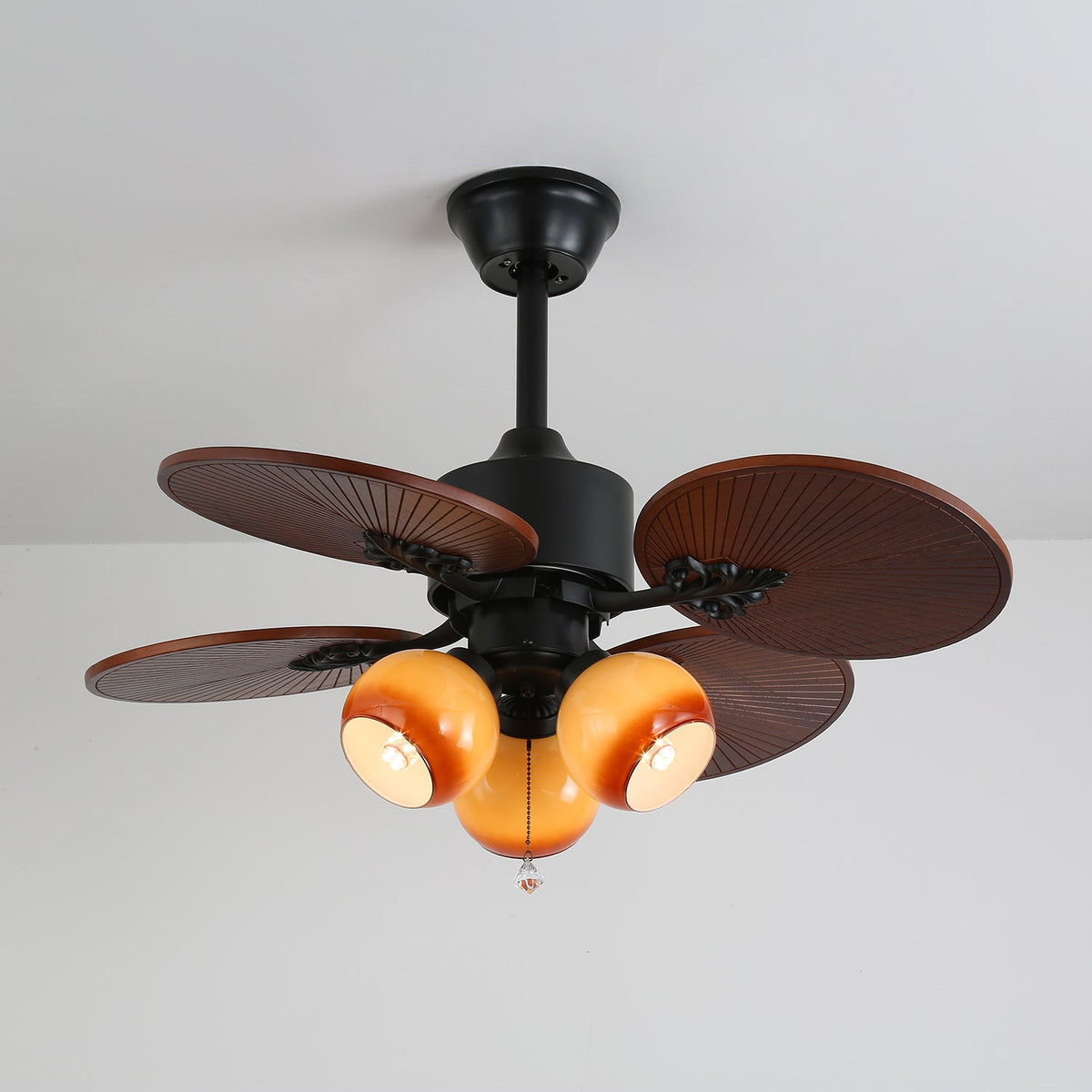 Tropica Breeze Ceiling Fan Light with Palm Blades and Amber Glass