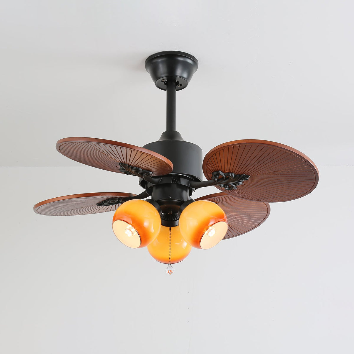Tropica Breeze Ceiling Fan Light with Palm Blades and Amber Glass
