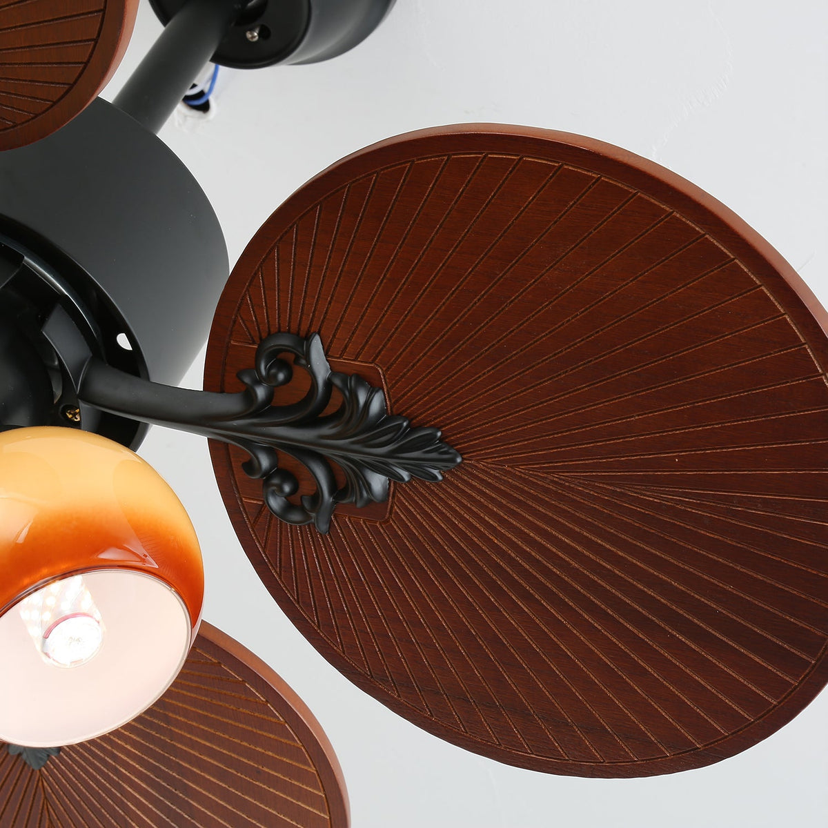 Tropica Breeze Ceiling Fan Light with Palm Blades and Amber Glass