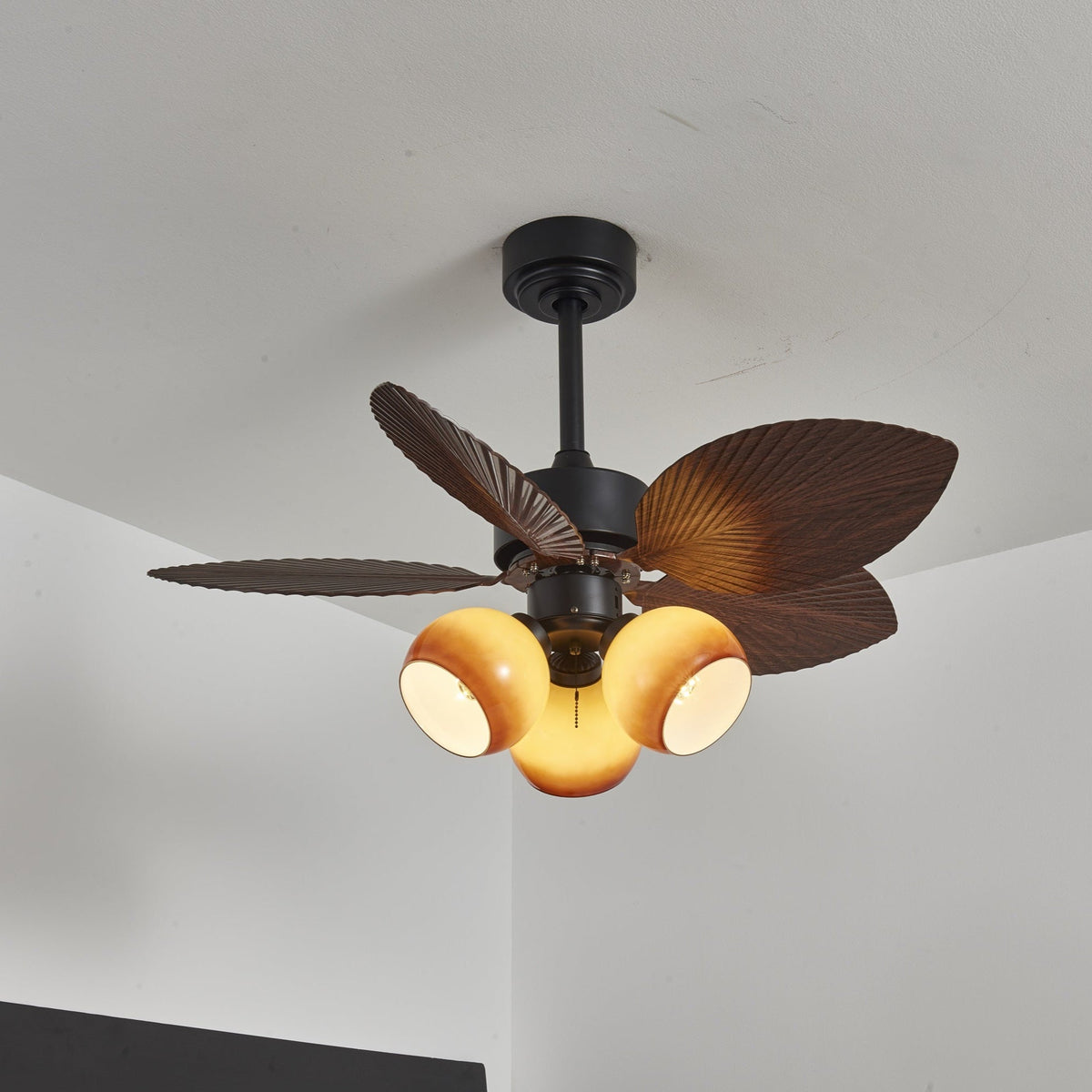 Tropiluxe Ceiling Fan Light with Palm Leaf Blades and Amber Glass Shade