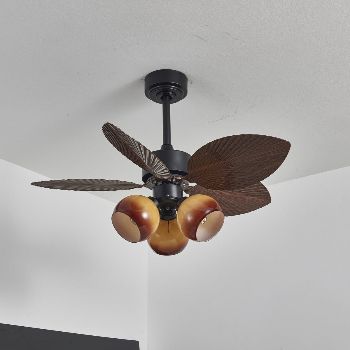 Tropiluxe Ceiling Fan Light with Palm Leaf Blades and Amber Glass Shade