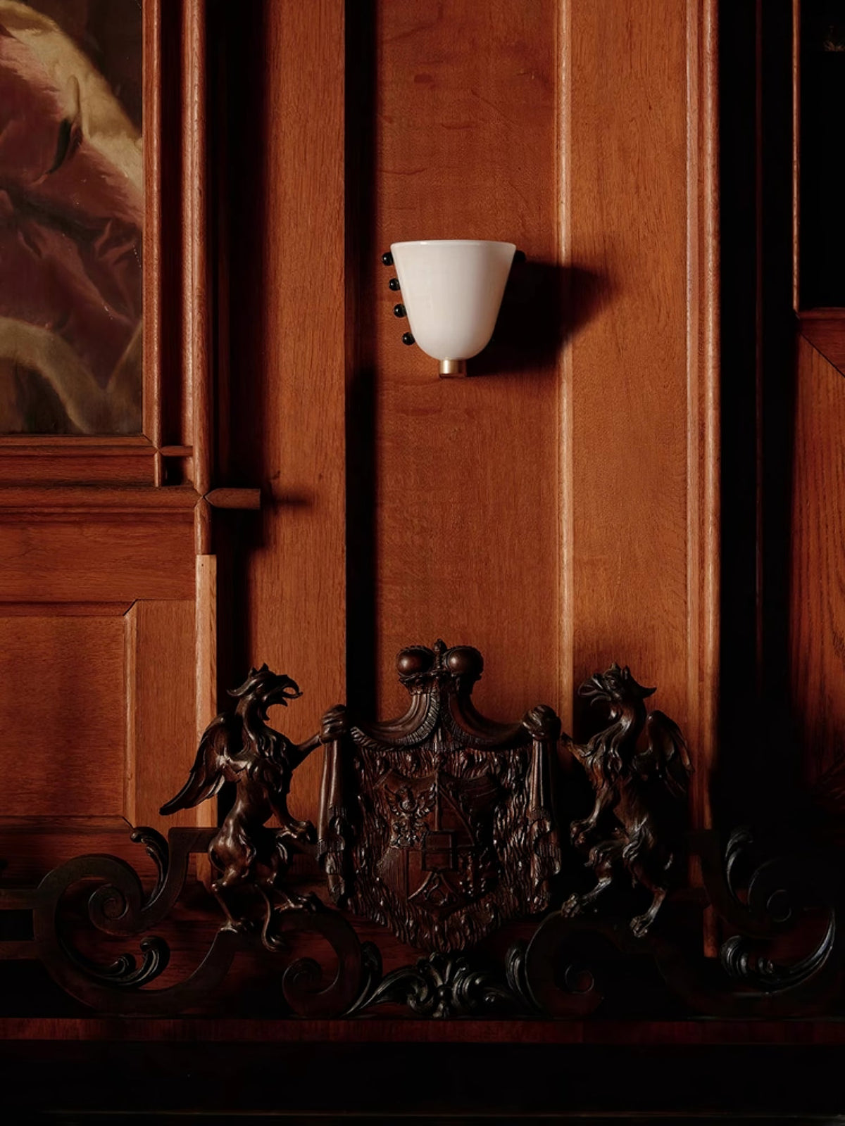 Velora Sculptural Wall Sconce in Matte Gold with Glass Shade