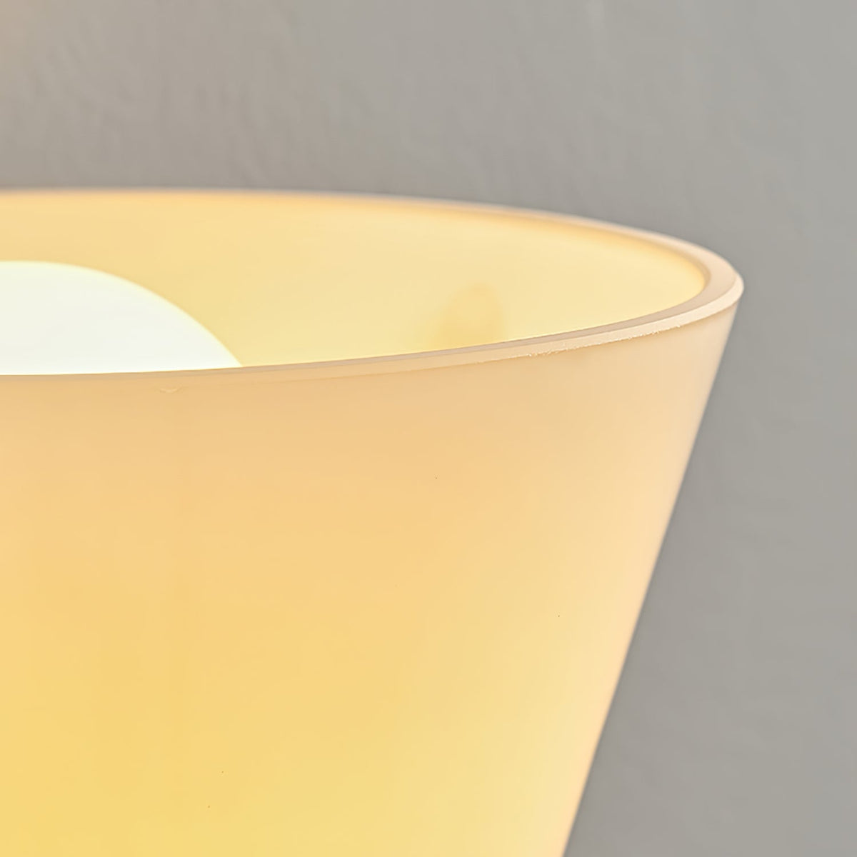 Velora Sculptural Wall Sconce in Matte Gold with Glass Shade