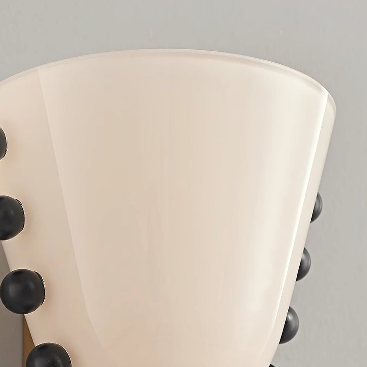 Velora Sculptural Wall Sconce in Matte Gold with Glass Shade
